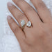 pear-cut lab-grown diamond toi et moi engagement ring in finger