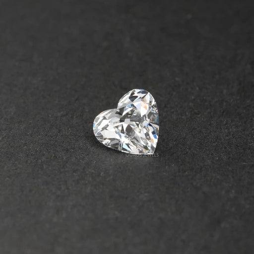 side view of old mine heart cut eco-friendly diamond on black fabric