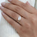 marquise cut lab diamond wave engagement ring in yellow gold wear in finger