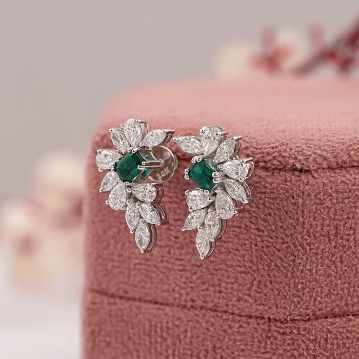 emerald gemstone and cluster diamond earrings