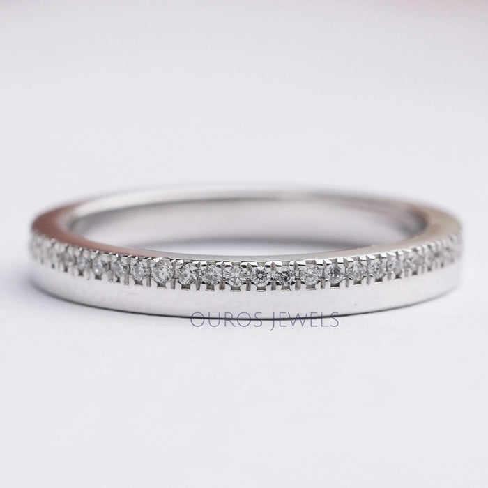 front view of round lab grown diamond half eternity wedding band white gold
