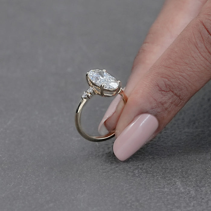 side view of moval cut lab diamond solitaire accent engagement ring