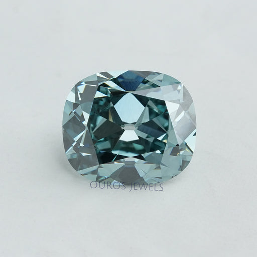 front view of vivid bluish green cushion cut lab grown diamond