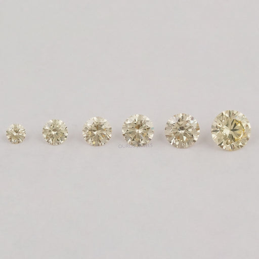 front view of brilliant round yellow loose lab grown diamonds