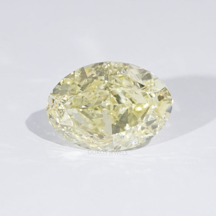 front view of fancy yellow modified oval cut lab grown diamond loose