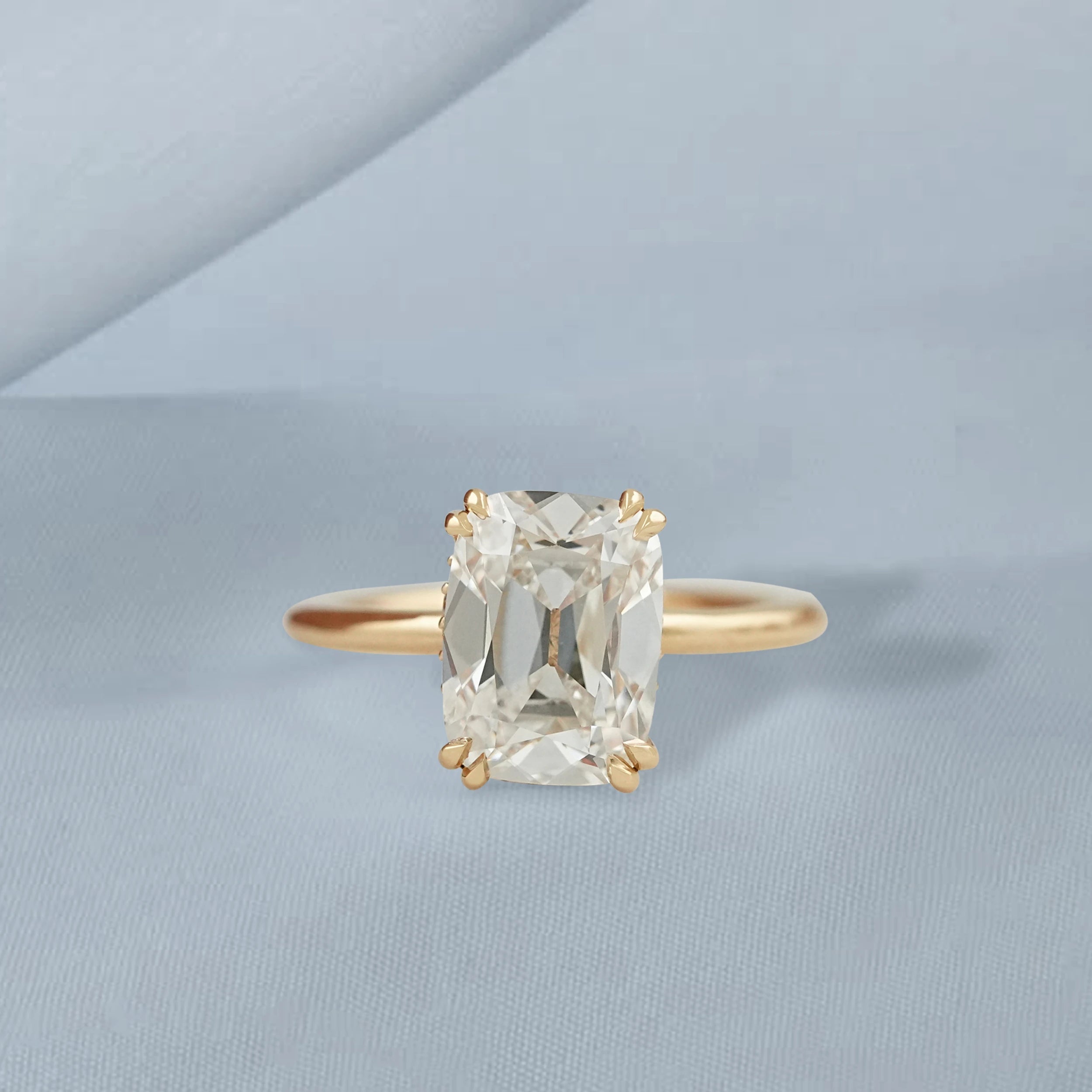 Cushion cut diamond solitaire ring