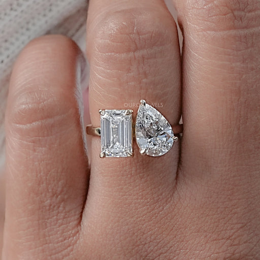 front view of pear and emerald cut lab diamond two-stone toi et moi engagement ring