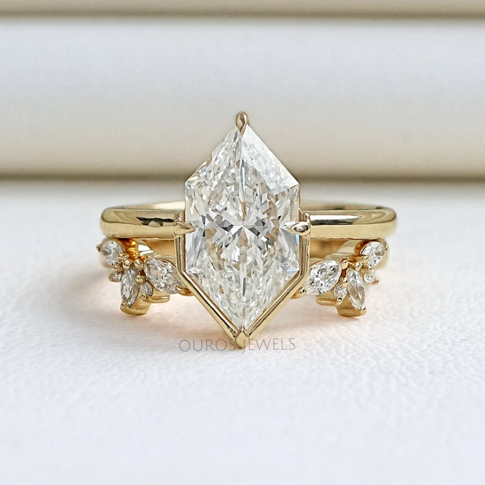 front view of dutch marquise cut diamond wedding ring set with yellow gold band