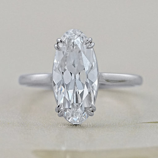 front angle view of old mine moval cut diamond solitaire engagement ring