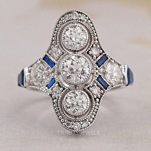 front view of art deco old european three-round cut diamond engagement ring