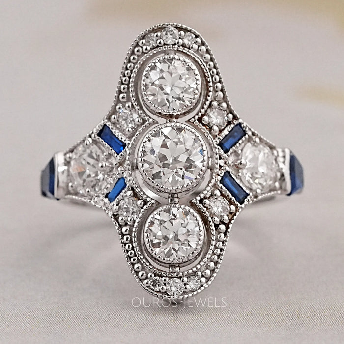 front view of art deco old european three-round cut diamond engagement ring
