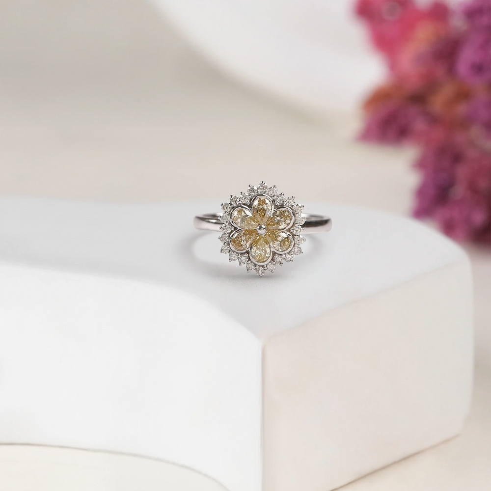 floral style yellow pear cut diamond halo ring