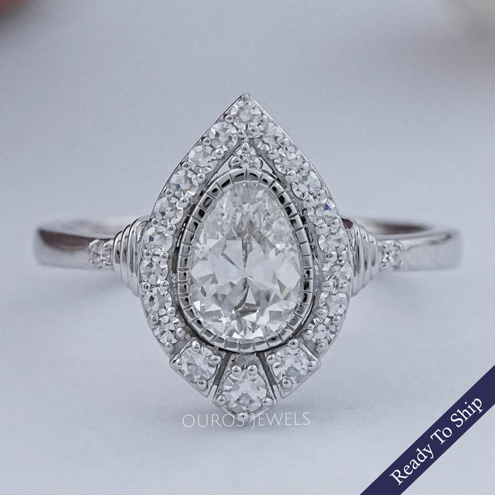 Old Mine Pear Cut  And Single Round Halo Engagement Ring