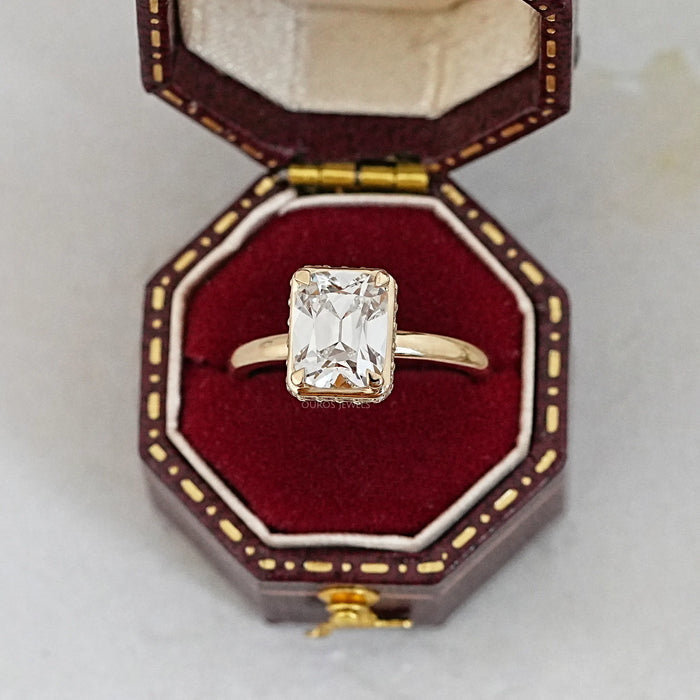 old mine cushion cut diamond hidden halo engagement ring in jewelry box
