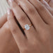 old mine cushion cut lab diamond petal solitaire engagement ring on model hand