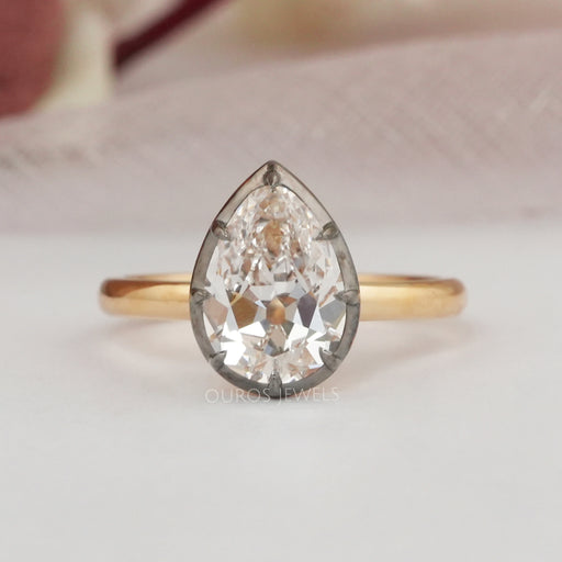 front view of antique old cut pear shaped diamond engagement ring
