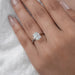 old mine cushion cut lab diamond solitaire engagement ring in finger