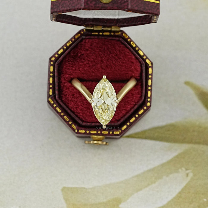 yellow old mine marquise diamond V-shape solitaire colored wedding ring in jewelry box