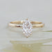 top view of marquise cut lab diamond solitaire engagement ring prong setting