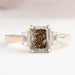 front view of olive radiant cut lab diamond three stone engagement ring