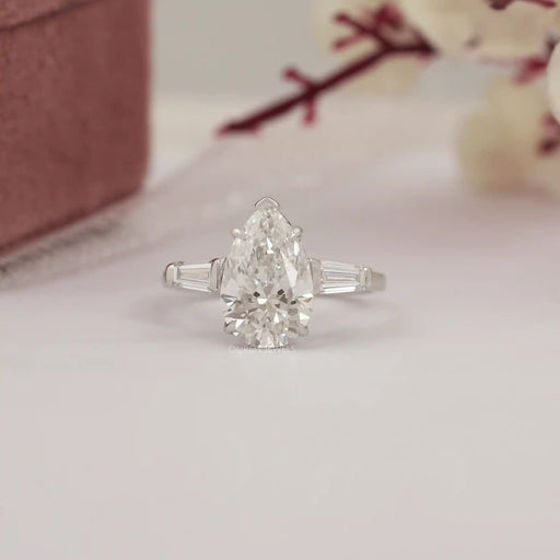 pear diamond three stone ring 