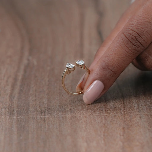 side view of two stone pear-cut lab diamond toi et moi open cuff wedding ring