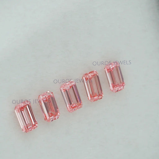 side view of pink elongated emerald cut lab created diamonds loose