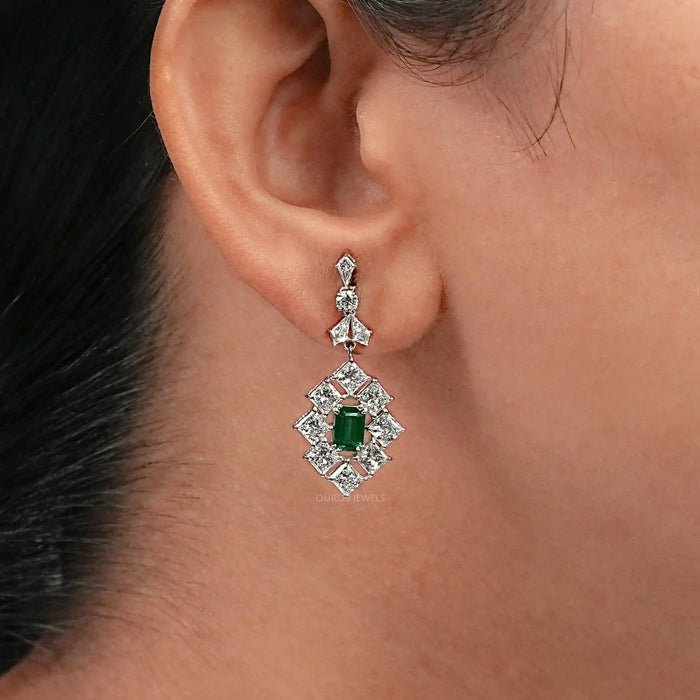 princess cut diamond drop earrings with green emerald gemstone