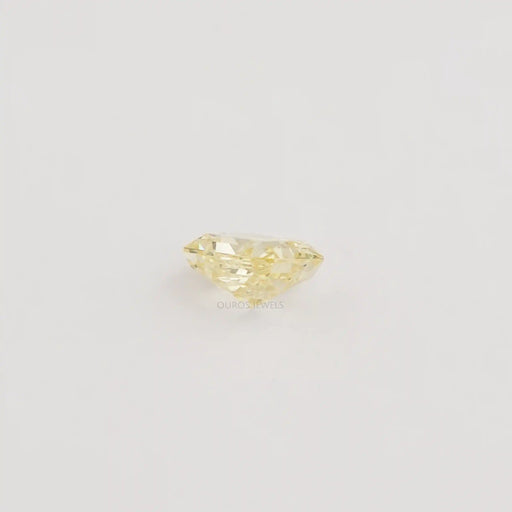 side view of fancy yellow radiant cut lab grown loose diamond
