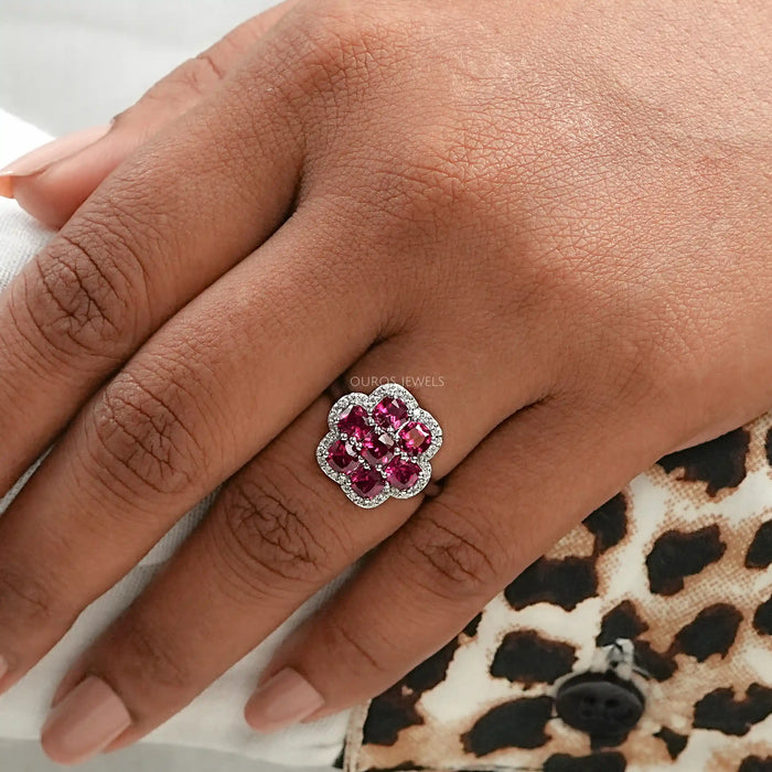 red ruby cushion floral halo ring 