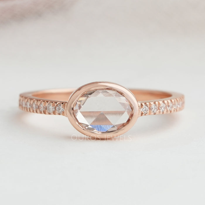 front view of east-west rose-cut oval diamond solitaire engagement ring bezel set