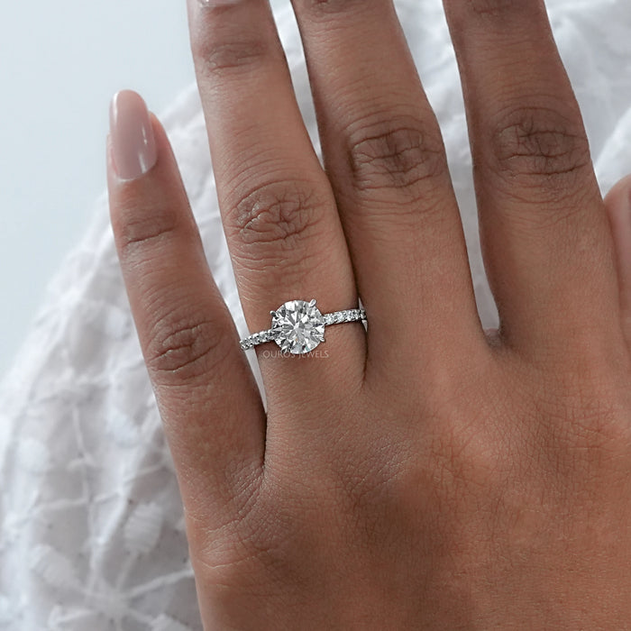 round lab diamond white gold solitaire wedding ring on model's finger