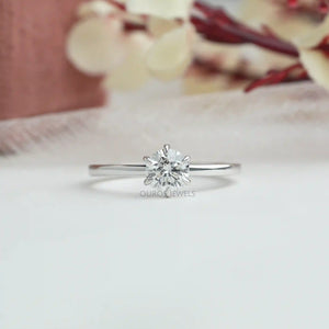 [a white gold solitaire engagement ring with a diamond in the center]-[Ouros Jewels]