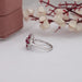 ruby cushion engagement ring with halo of lab grown diamond