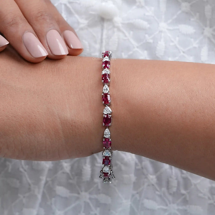 red oval ruby and pear diamond bracelet