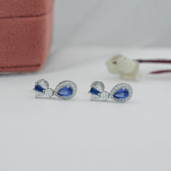 Pear Blue Gemstone And Tapered Baguette Halo Drop Earrings