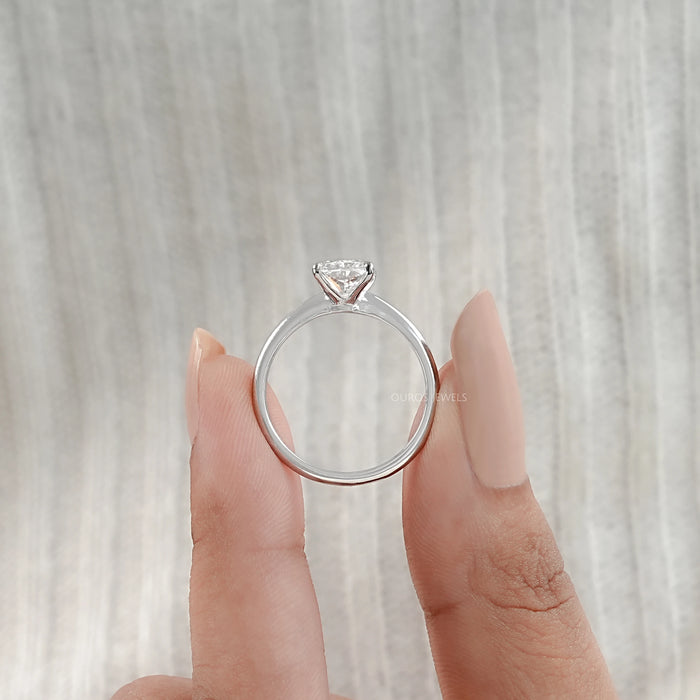 close-up view of radiant cut diamond solitaire engagement ring