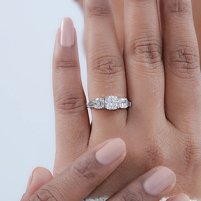 square cushion cut lab diamond five stone engagement ring in finger