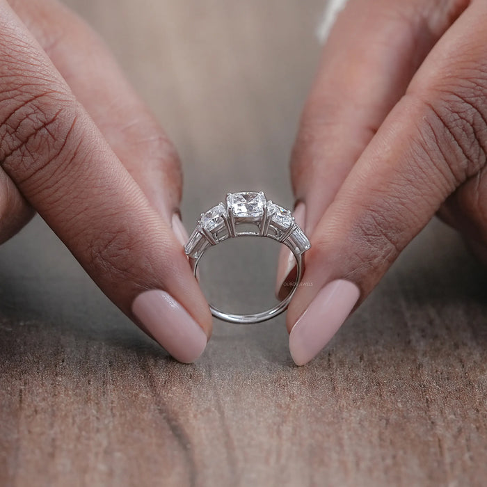 close view of square cushion cut lab diamond five stone engagement ring