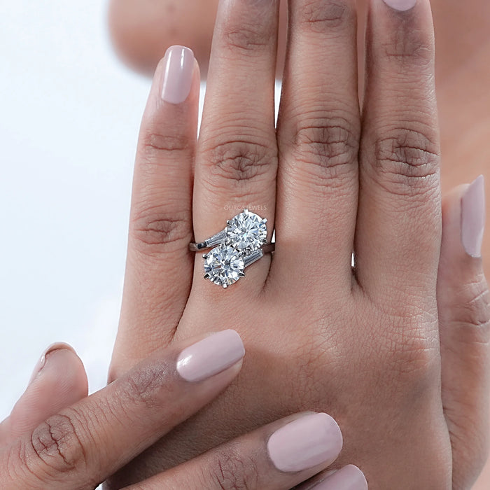 round-cut lab-grown diamond toi et moi anniversary ring in finger