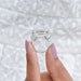  Emerald cut diamond three stone ring