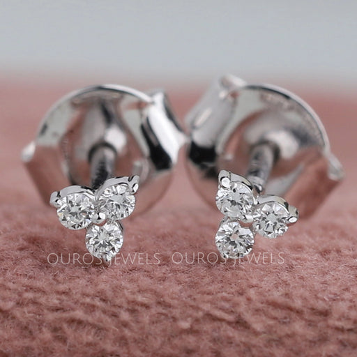 front view of trinity tiny round diamond push back stud earrings white gold 