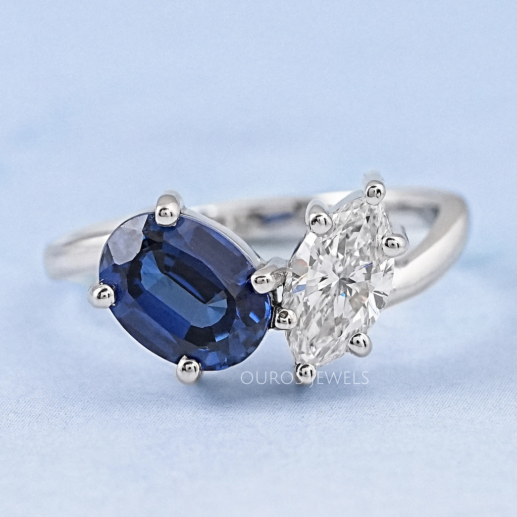 front view of sapphire oval & marquise diamond two stone toi et moi engagement ring