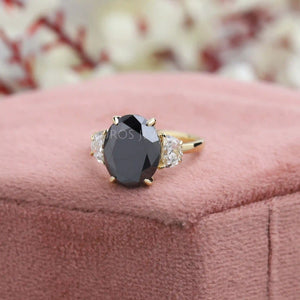 black oval three stone engagement ring 