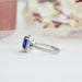 Side View of Blue Cushion Cut Halo Ring