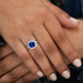 A Women wearing Cushion Cut Blue sapphire gemstone Diamond Ring