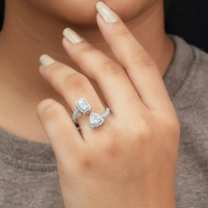 A Women wearing Emerald and Trillion Cut Diamond Ring