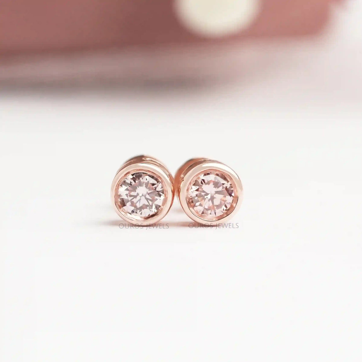 Rose Gold Plated Bezel set Heart Earrings Created with Zircondia Crystals  by Philip Jones Jewellery