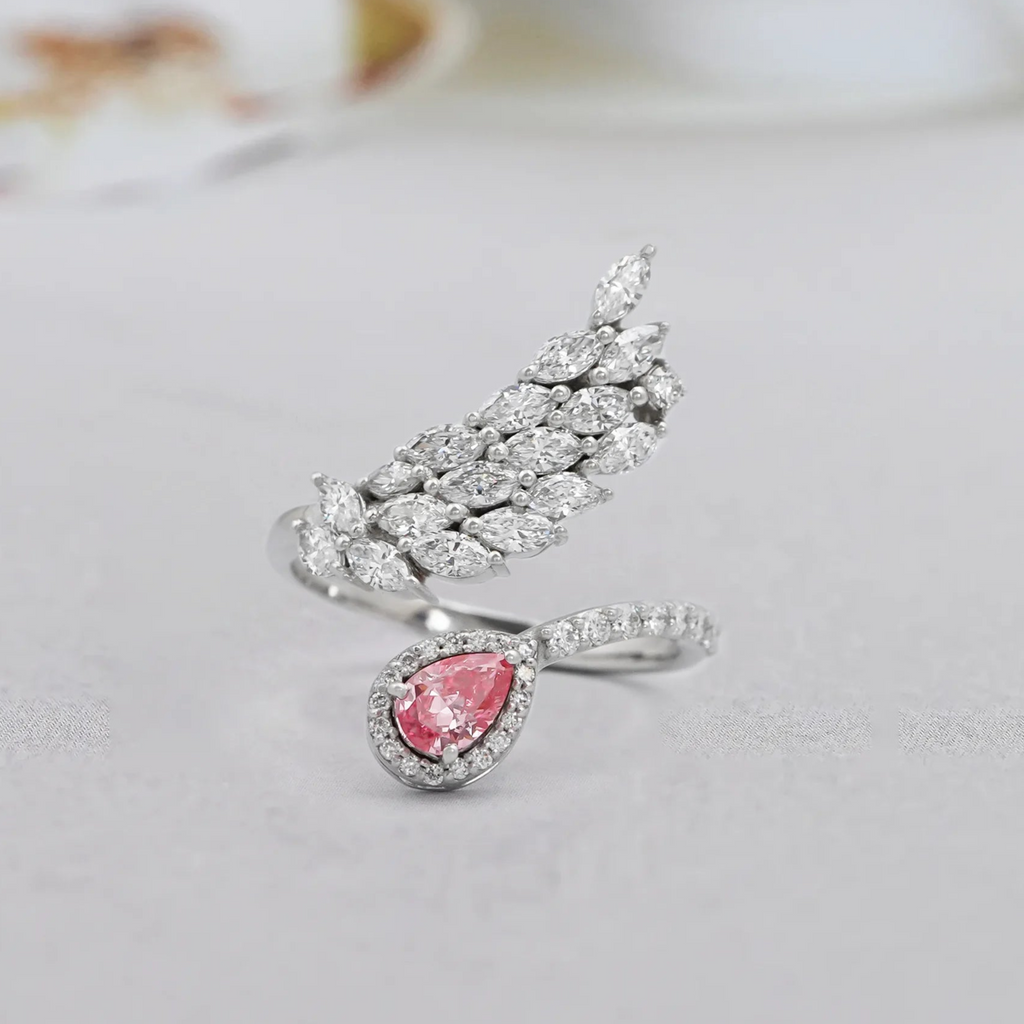 pink pear halo diamond bypass ring 