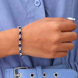 [A Women wearing Blue Cushion Cut Bracelet]-[Ouros Jewels]